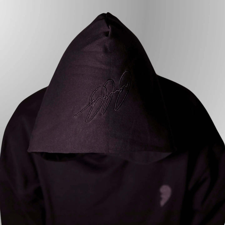 Sleek black hoodie, Midnight black pullover, All-black hoodie, Shadow black sweatshirt, Noir hooded jacket, Dark on dark hoodie, Stealthy black outerwear, Monochrome hoodie, Blackout hoodie, Obsidian hooded sweatshirt, Onyx black hoodie, Ebony pullover, Shadowy black hoodie, Matte black sweatshirt, Jet black hooded top, Midnight noir hoodie, Deep black hoodie, Charcoal black pullover, Blackened hoodie, Noir-on-noir hoodie,