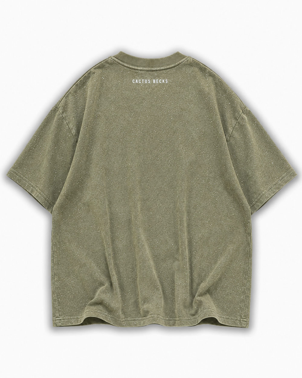 Green t-shirt with glitter dots and a small Cactus Becks logo on a white background