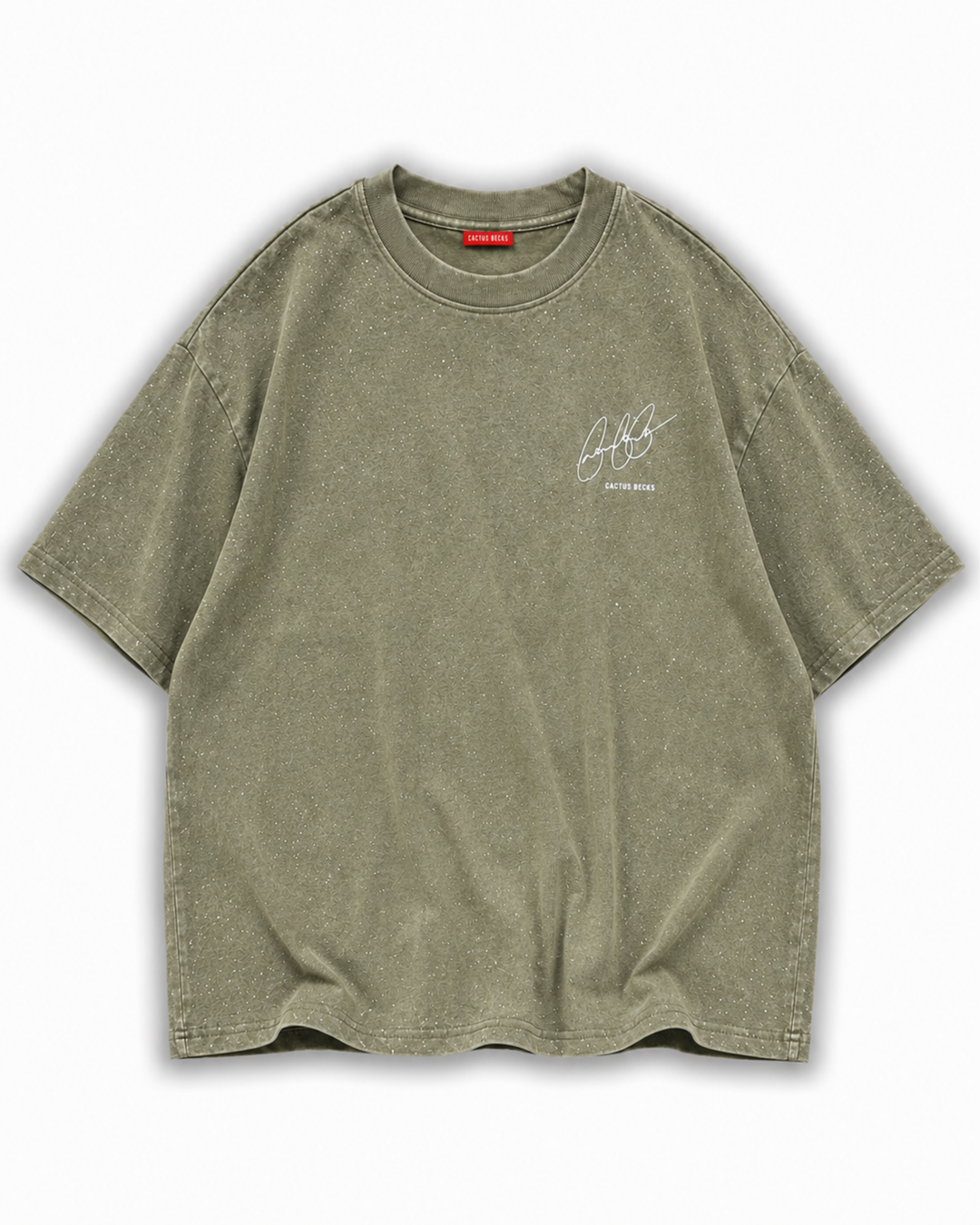 Green t-shirt with glitter dots and a small Cactus Becks logo on a white background