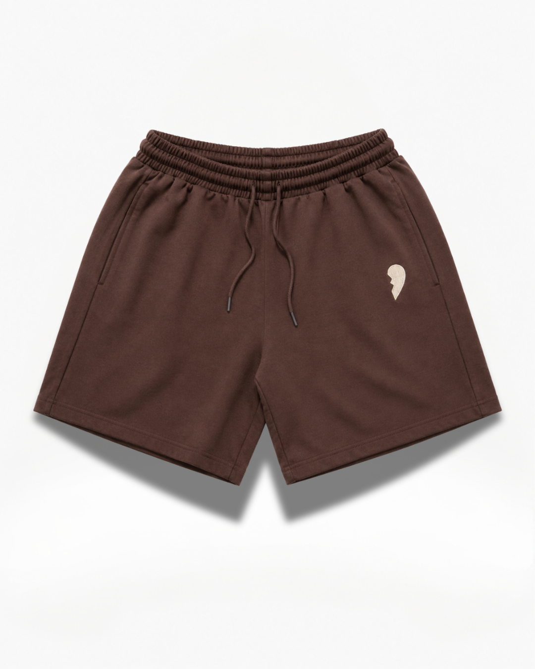 Brown Cactus Becks shorts with a small broken heart logo on a white background