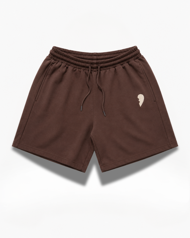 Brown Cactus Becks shorts with a small broken heart logo on a white background