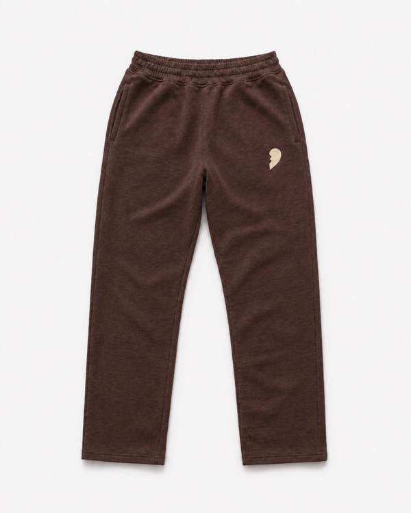 Brown track pants by Cactus Becks with a broken heart on the front