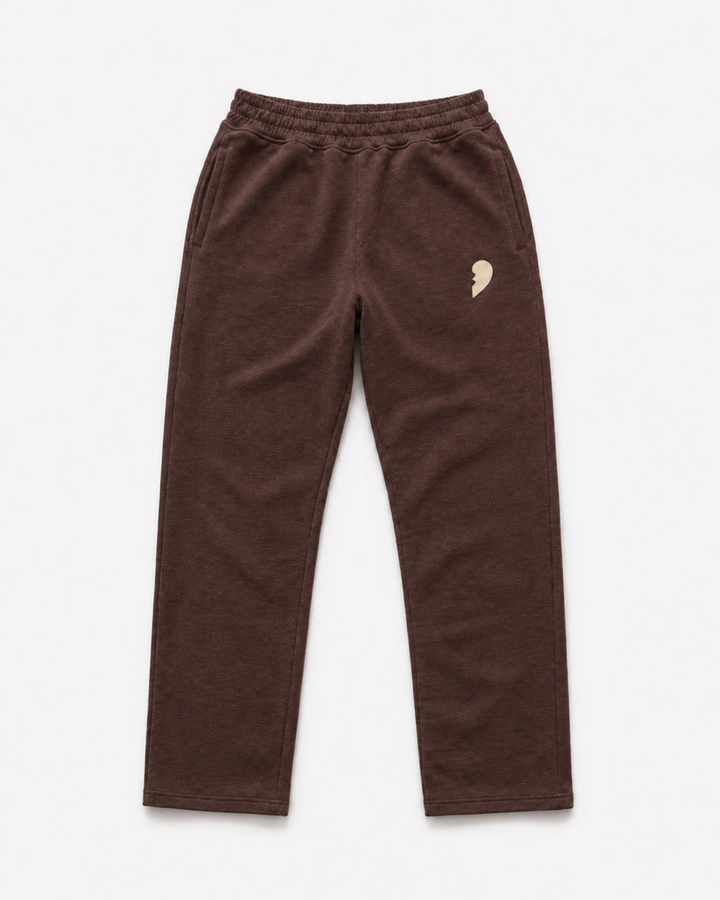 Brown track pants by Cactus Becks with a broken heart on the front