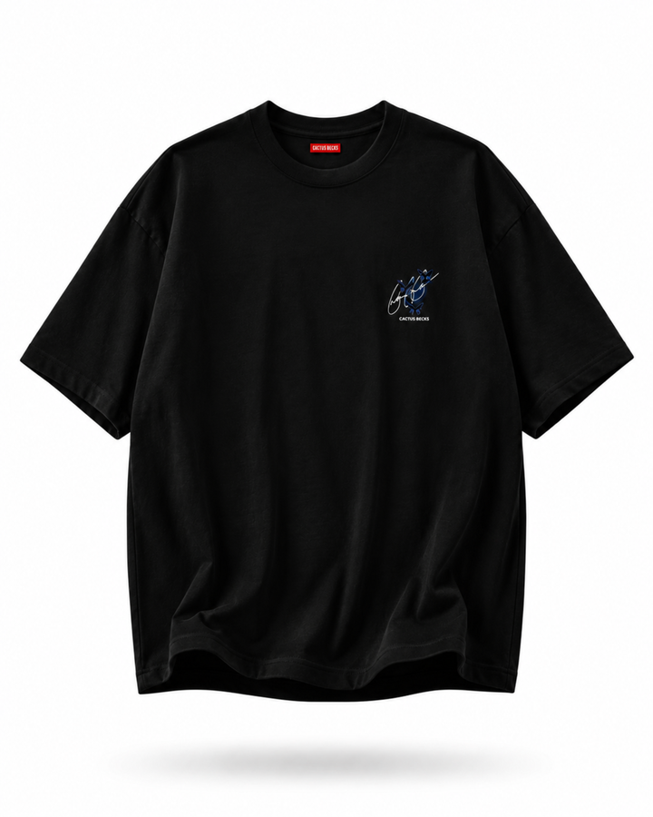 Black t-shirt with a small logo on a white background