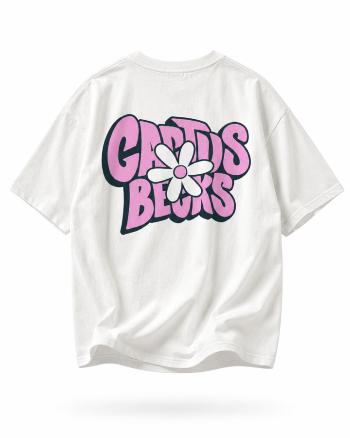 White t-shirt with pink 'Cactus Becks' text and a daisy flower graphic on a white background