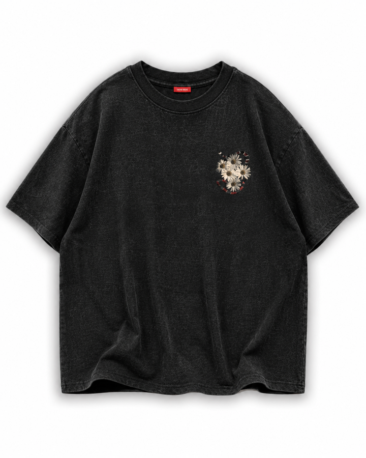 Black t-shirt with floral and snake design on a white background by Cactus Becks