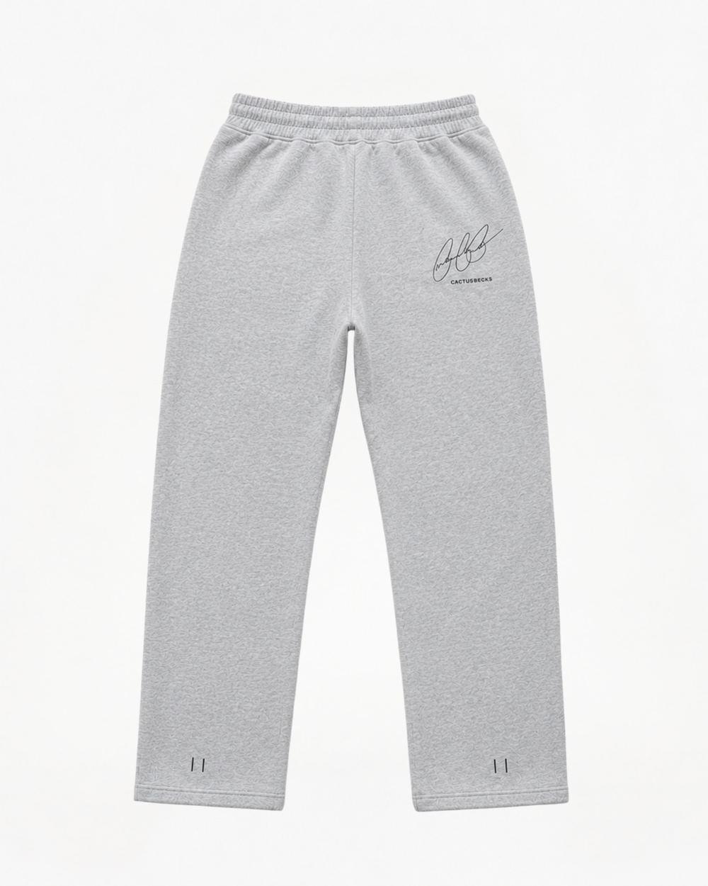Grey track pants with Cactus Becks embroidery on the back and the 11/11 angel numbers