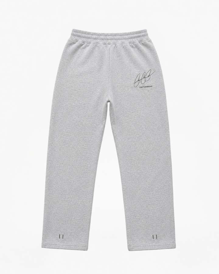 Grey track pants with Cactus Becks embroidery on the back and the 11/11 angel numbers