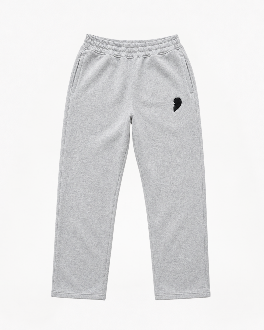Gray track pants by cactus becks with a broken heart on the front