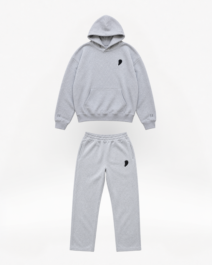 Gray hoodie and pants set with a broken heart , 'Cactus Becks' branding on a white background