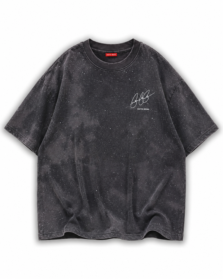 Black t-shirt with glitter dots and a small Cactus Becks logo on a white background