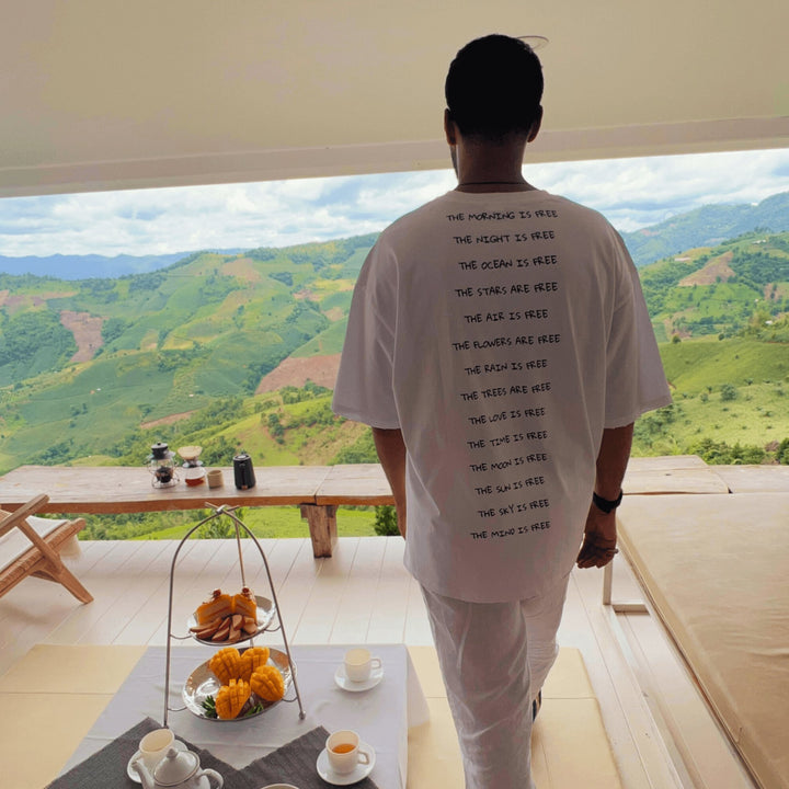 Introducing The Frog T-shirt in White. It's made in high-end quality cotton. The distressed effects fits relaxed in the body with dropped shoulders. Iconic Cactus Becks signature at the front. The back is inspired by the lively spirit of the frog. This t-shirt is a canvas for adventure and artistic expression. The Mind Is Free.