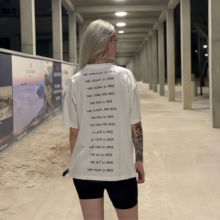 Introducing The Frog T-shirt in White. It's made in high-end quality cotton. The distressed effects fits relaxed in the body with dropped shoulders. Iconic Cactus Becks signature at the front. The back is inspired by the lively spirit of the frog. This t-shirt is a canvas for adventure and artistic expression. The Mind Is Free.