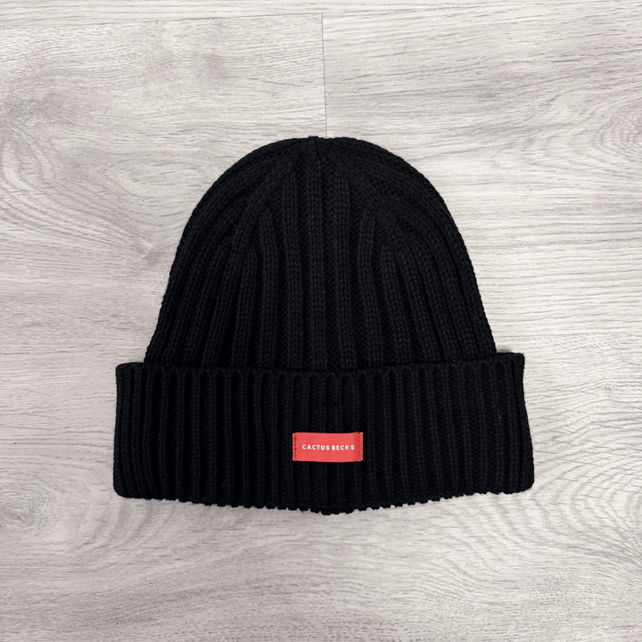 Expertly crafted from a soft, cozy blend of wool and acrylic, this beanie offers unbeatable warmth and comfort, making it the perfect accessory for chilly days.